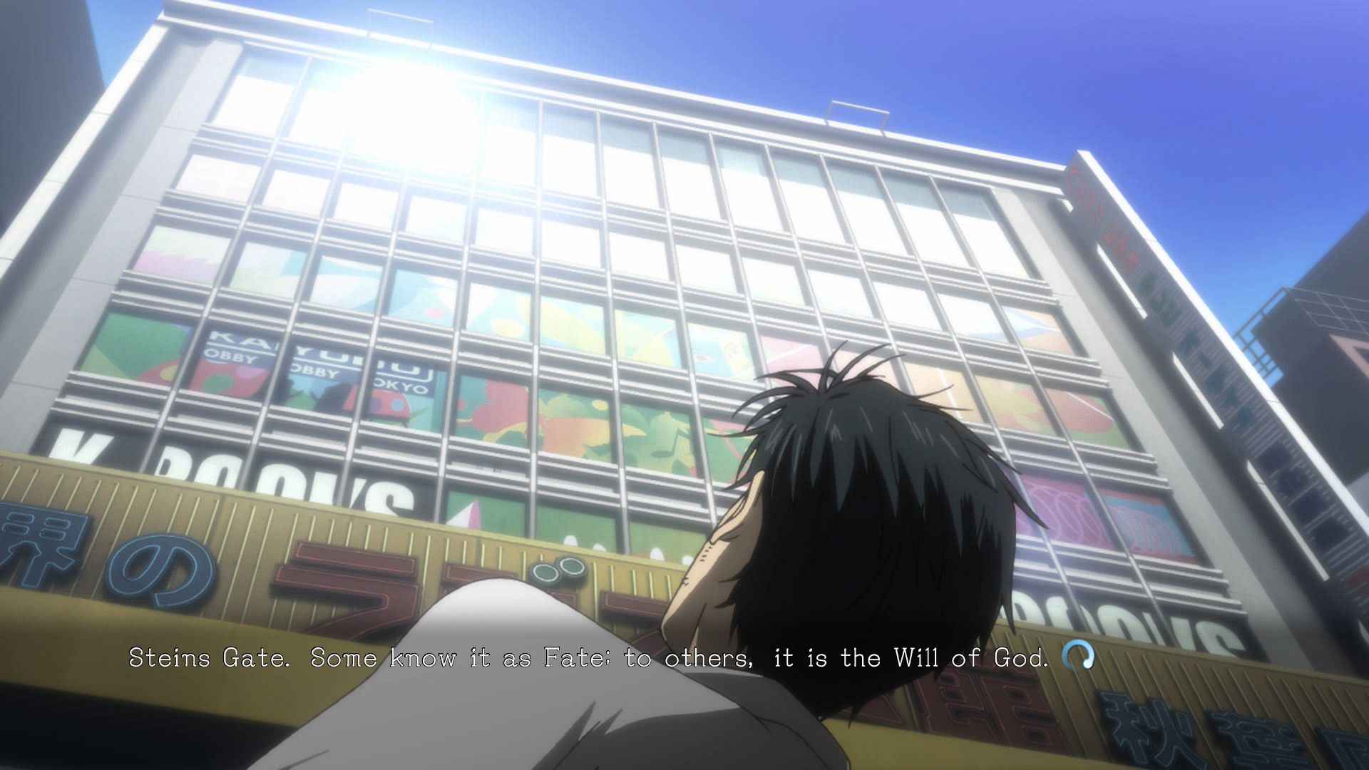Okabe looking up at a building with colorful advertisements on a sunny day